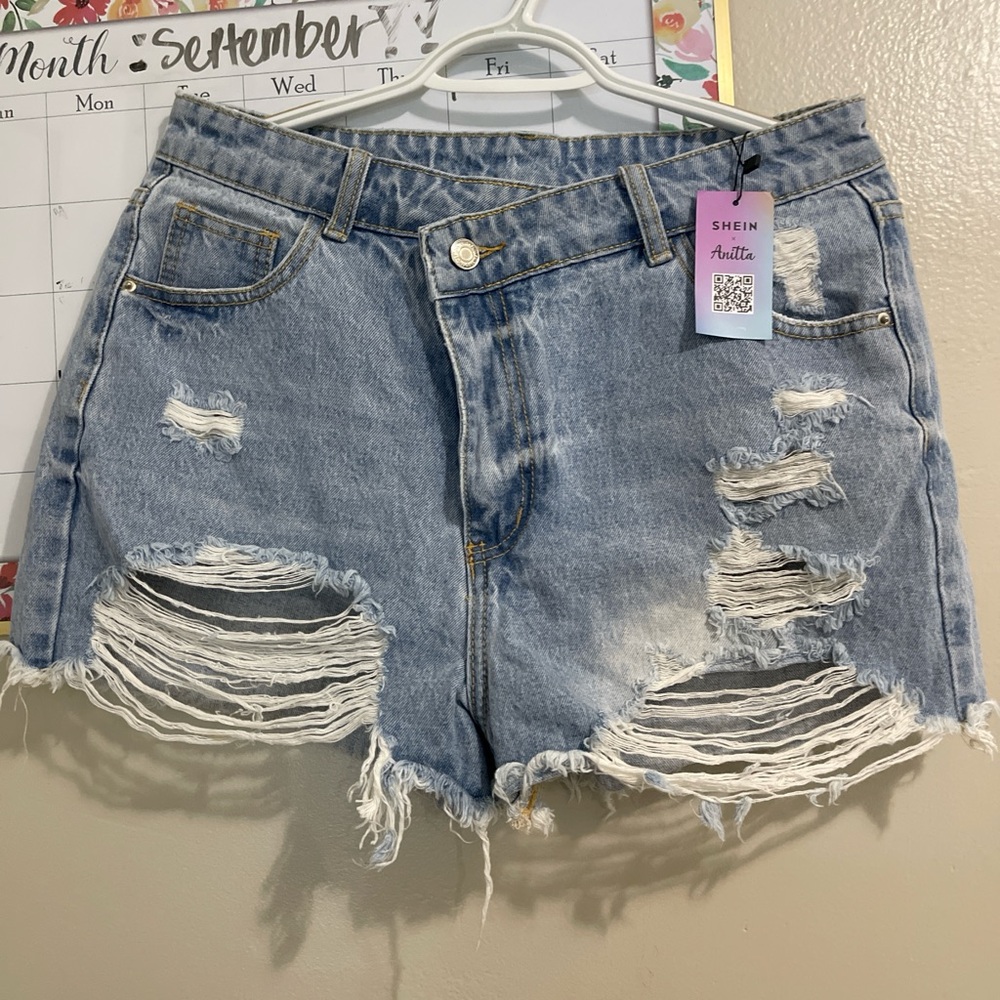 SHEIN Light Blue Ripped Jean Shorts